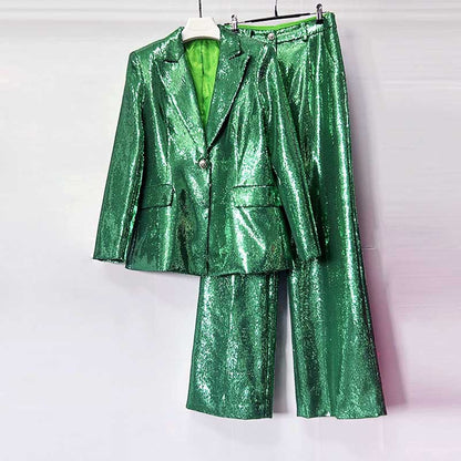 Emerald green sequin pantsuit for women featuring a shiny blazer and wide-leg trousers