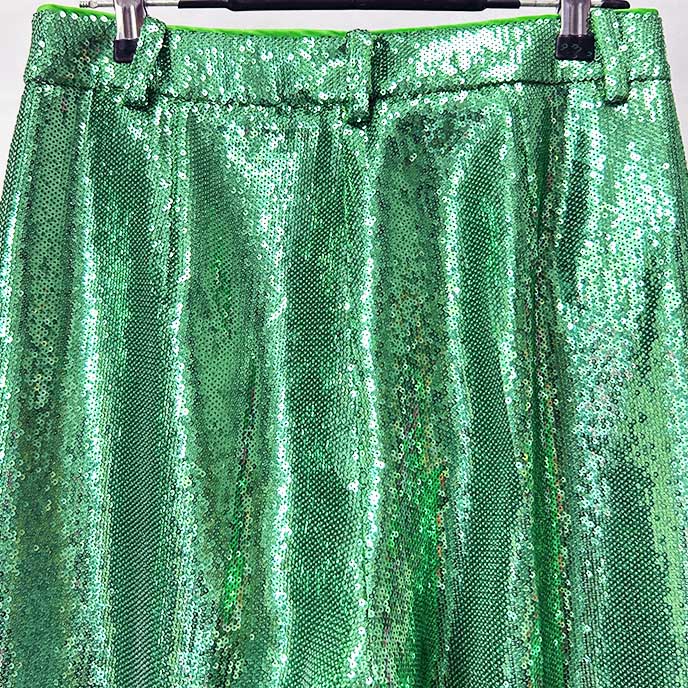 Emerald green sequin pantsuit for women showcasing elegant shimmer and stylish design details