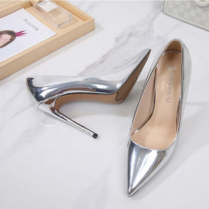 SD Dresscode event-ready patent leather pumps in silver with sleek pointy toe and high stiletto heel