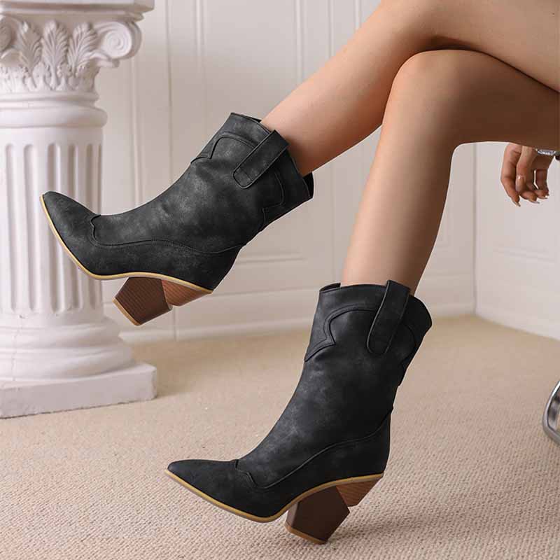Stylish black fashion wedge boots for women with a pointed toe and chunky heel