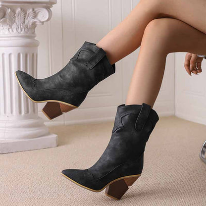 Stylish black fashion wedge boots for women with a pointed toe and chunky heel