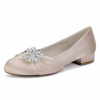 Elegant beige flat wedding shoes for bride with jeweled embellishment and comfortable design