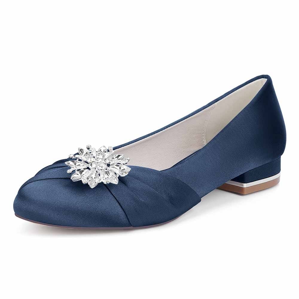 Navy flat wedding shoes for bride with decorative jeweled embellishment and elegant design