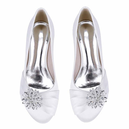 Elegant S&DCo. flat wedding shoes for bride with shimmering jewel embellishment and soft white fabric