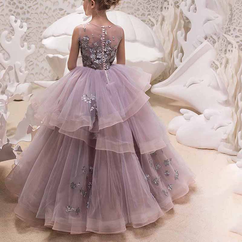 Elegant floor length ball gown for girls in soft lavender with layered tulle and floral accents