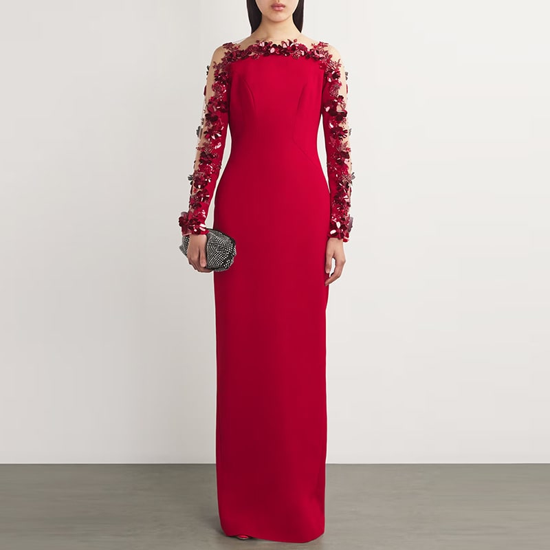 Red floral embellished formal gown with long sleeves and intricate floral detailing for elegant occasions