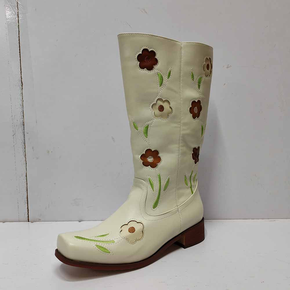 Elegant floral embroidered boots in cream color featuring decorative flower patterns
