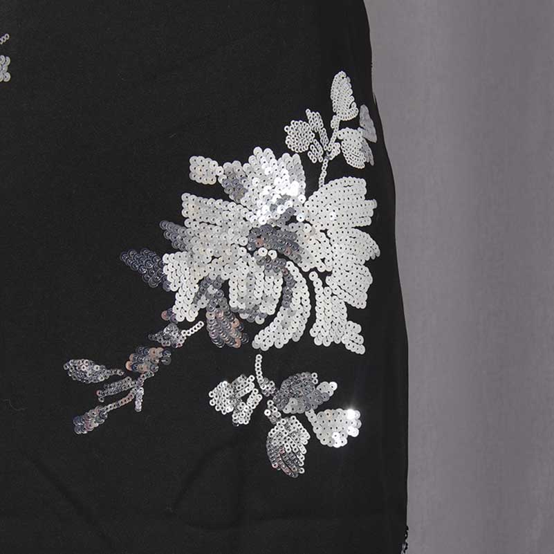 Floral sequin crop top skirt set featuring intricate flower designs and elegant sequins