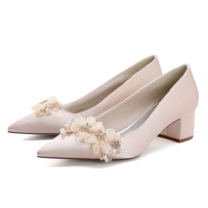 Flower appliqué wedding heels in soft pink with decorative floral details and comfortable block heels