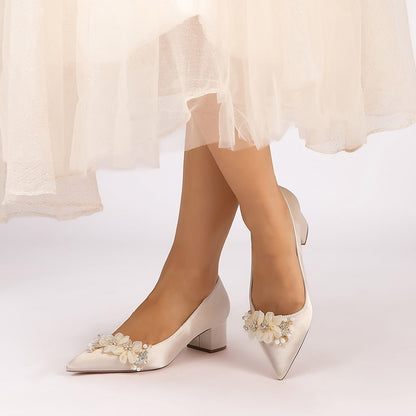 Elegant flower appliqué wedding heels with floral decorations, perfect for bridal attire
