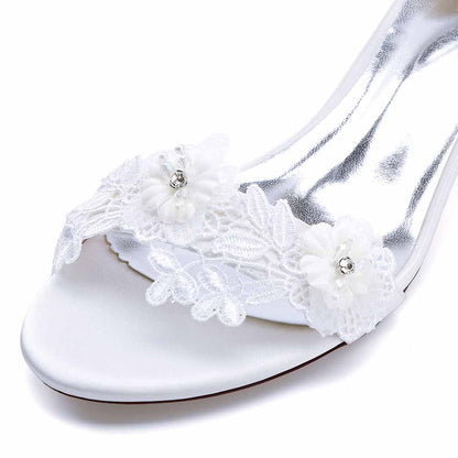 Elegant flower appliqué wedding shoes with delicate lace and floral embellishments for a stylish bridal look