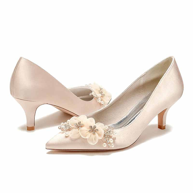 Elegant pink S&DCo. flower embellished wedding shoes for bride with pearl accents