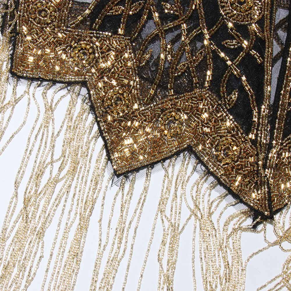 Elegant gatsby style beaded fringe cape featuring intricate beadwork and detailed fringes
