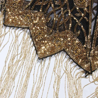 Elegant gatsby style beaded fringe cape featuring intricate beadwork and detailed fringes