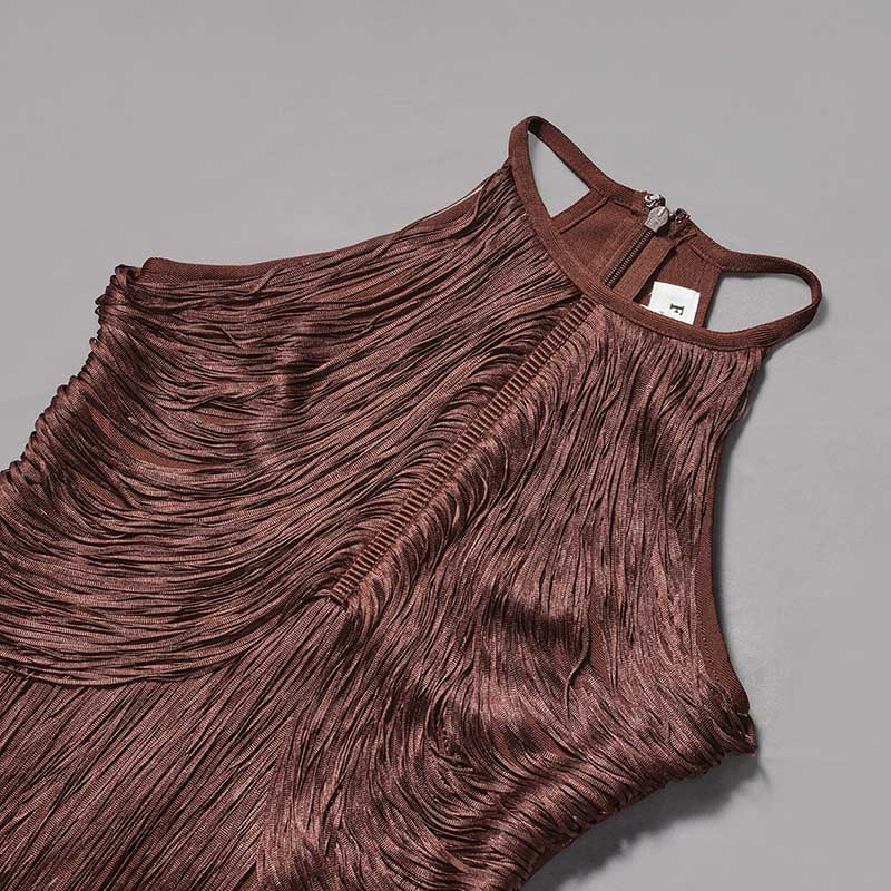 Brown skirt suit featuring a glam party gown with tassel design and sleek silhouette