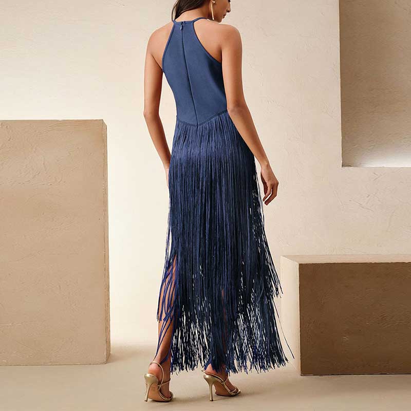 Elegant glam party gown with tassel detailing, showcasing a sleek design and fringed back for a stunning look
