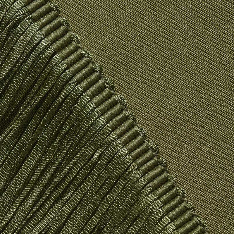 Close-up of luxurious fabric detail showcasing a glam party gown with tassel from SD Dresscode & Fashiontrends