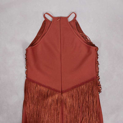 Back view of SD Dresscode glam party gown with tassel in rust color featuring fringe detailing