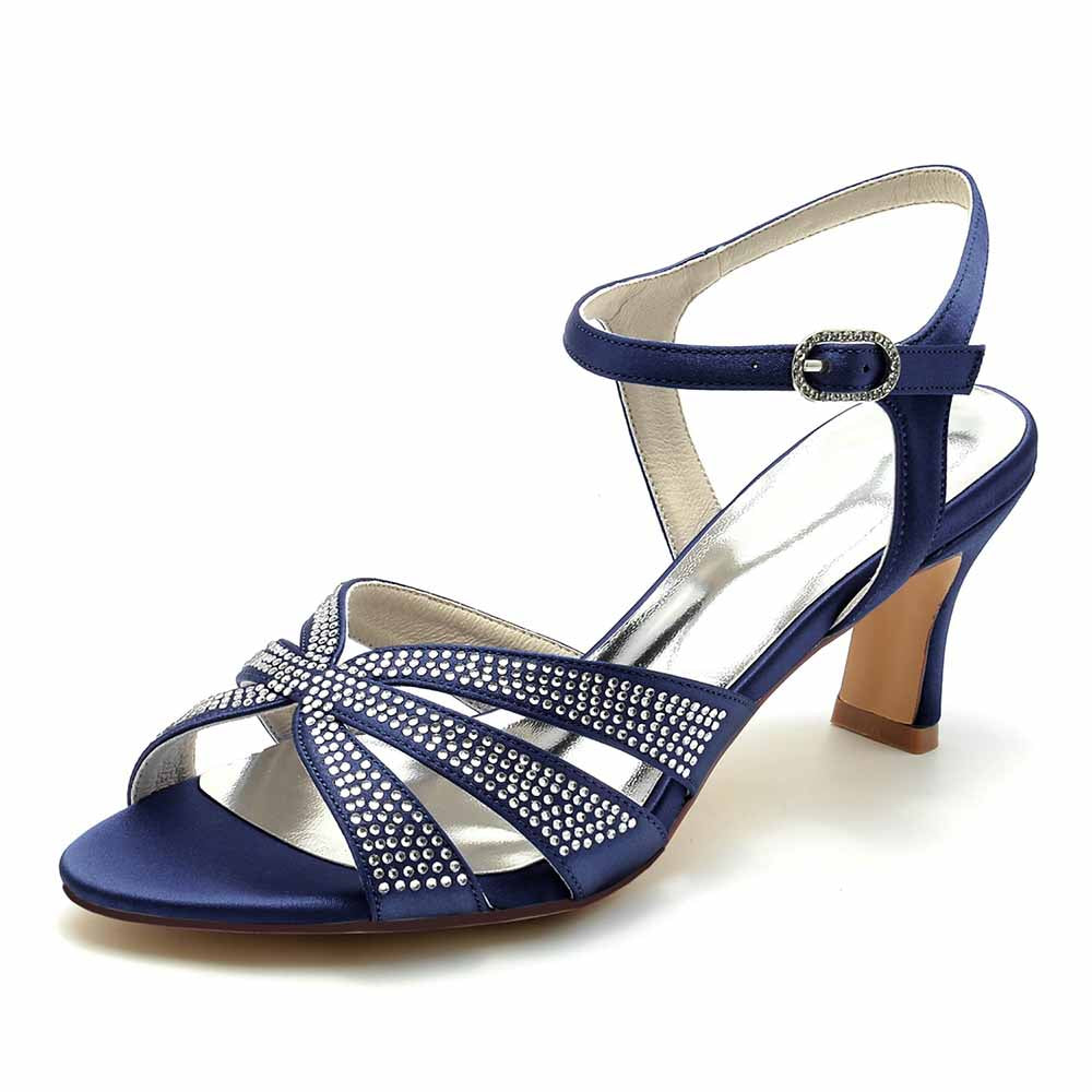 Blue glitter satin prom heels with crisscross design and ankle strap for elegant occasions