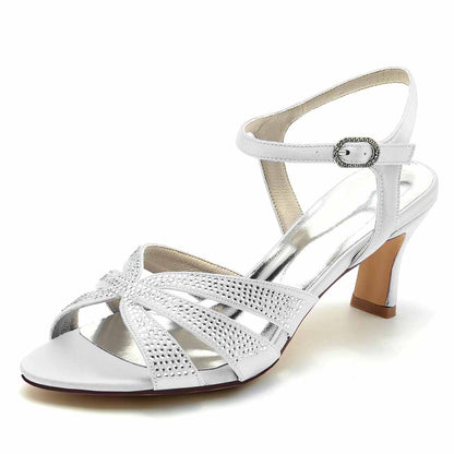 White glitter satin prom heels with cross-strap design and ankle buckle for elegant occasions