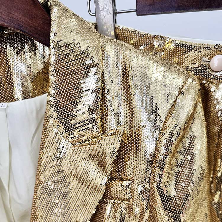 Stylish gold sequin blazer pantsuit for women with detailed close-up of shimmering fabric