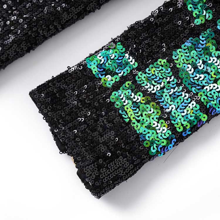 Close-up of a green sequin mini dress showcasing shimmering sequins for a stylish look