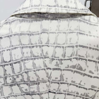 Ivory animal print suit for women featuring a stylish textured design for a fashionable look