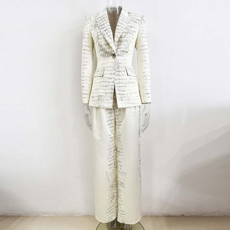 Ivory animal print suit for women by SD Dresscode & Fashiontrends, featuring a stylish blazer and matching pants.