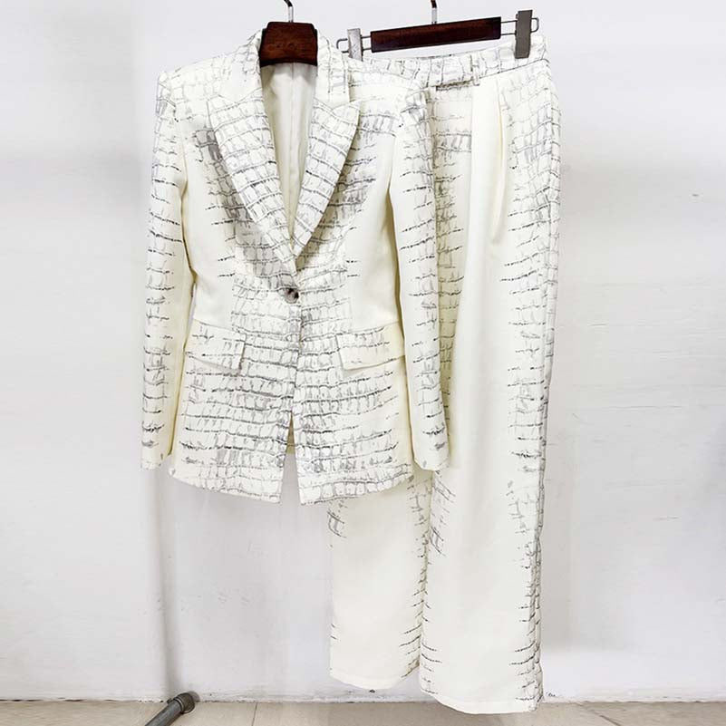 Ivory animal print suit for women featuring a stylish jacket and matching pants