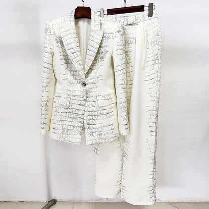 Ivory animal print suit for women featuring a stylish jacket and matching pants