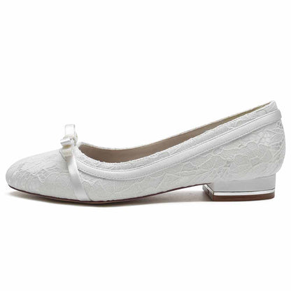 Elegant lace bridal flats with bow for a comfortable and stylish wedding look