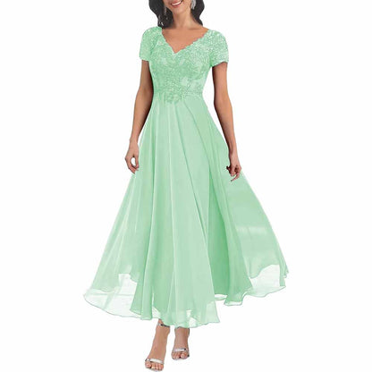 Elegant lace mother of the bride dress with sleeves in mint green featuring a flowing skirt