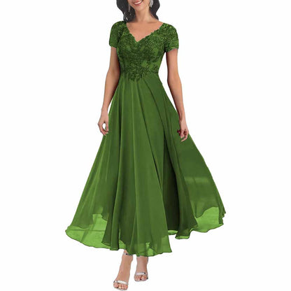 Elegant lace mother of the bride dress with sleeves in green, featuring a flowing skirt and detailed bodice