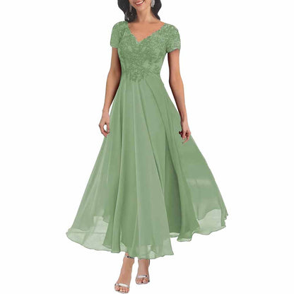 Elegant lace mother of the bride dress with sleeves in green featuring a flowing skirt