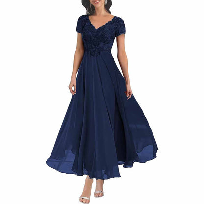 Elegant lace mother of the bride dress with sleeves in navy blue featuring a flowy skirt