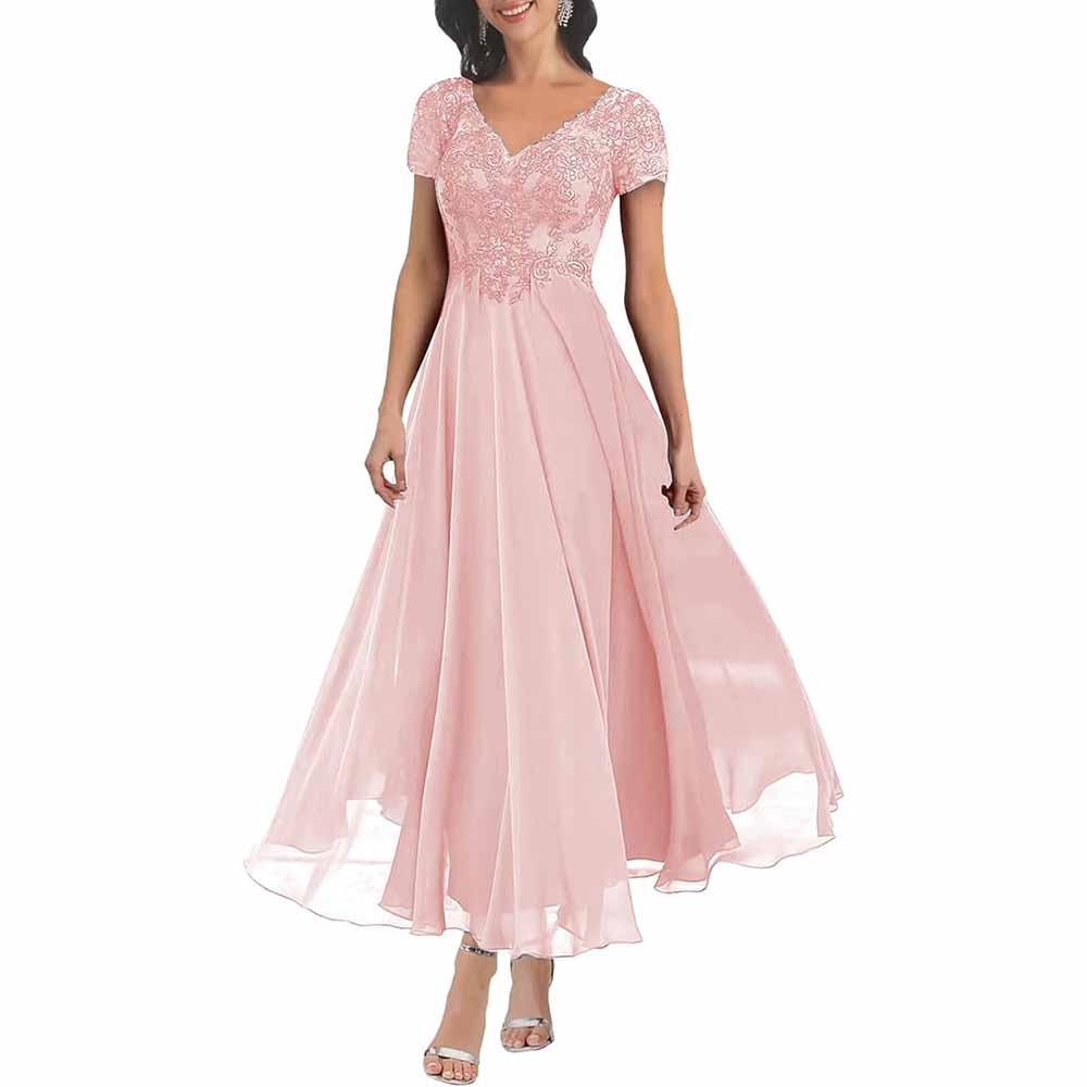 Elegant lace mother of the bride dress with sleeves in soft pink featuring a flowing skirt