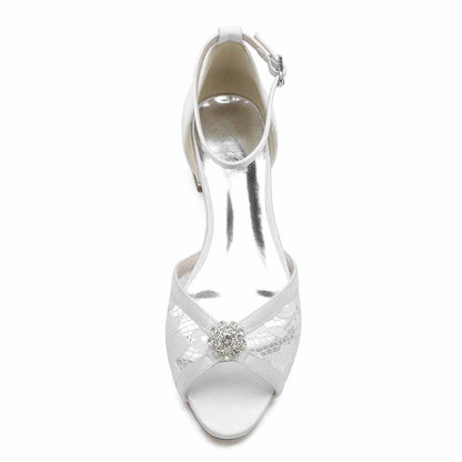 Elegant lace open toe wedding shoes with intricate lace detailing and a decorative gem accent