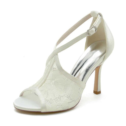 Elegant lace peep toe bridal shoes by S&DCo featuring a stylish high heel design