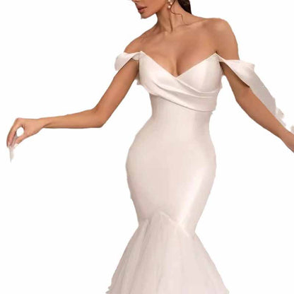 Elegant lace satin off shoulder bridal gown with a fitted silhouette and flowing skirt