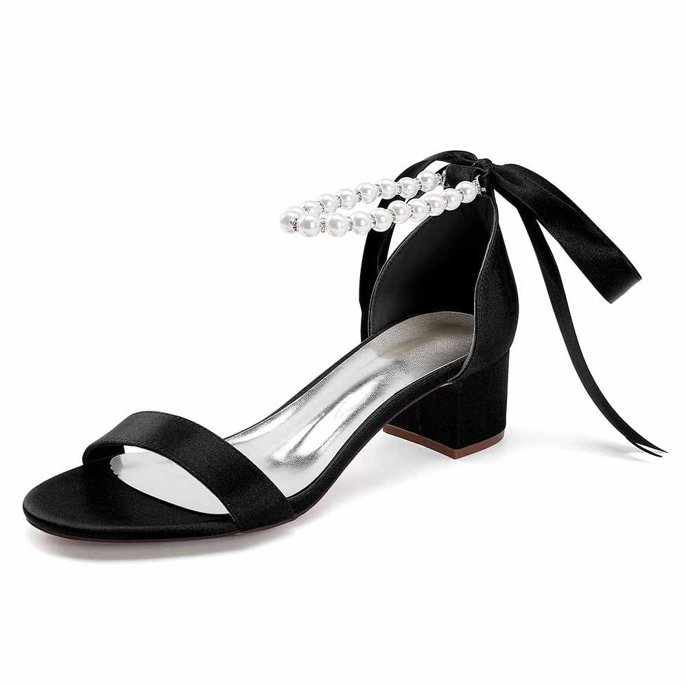 Lace up chunky heel dress shoes in black satin with pearl accents and stylish ties for elegant occasions
