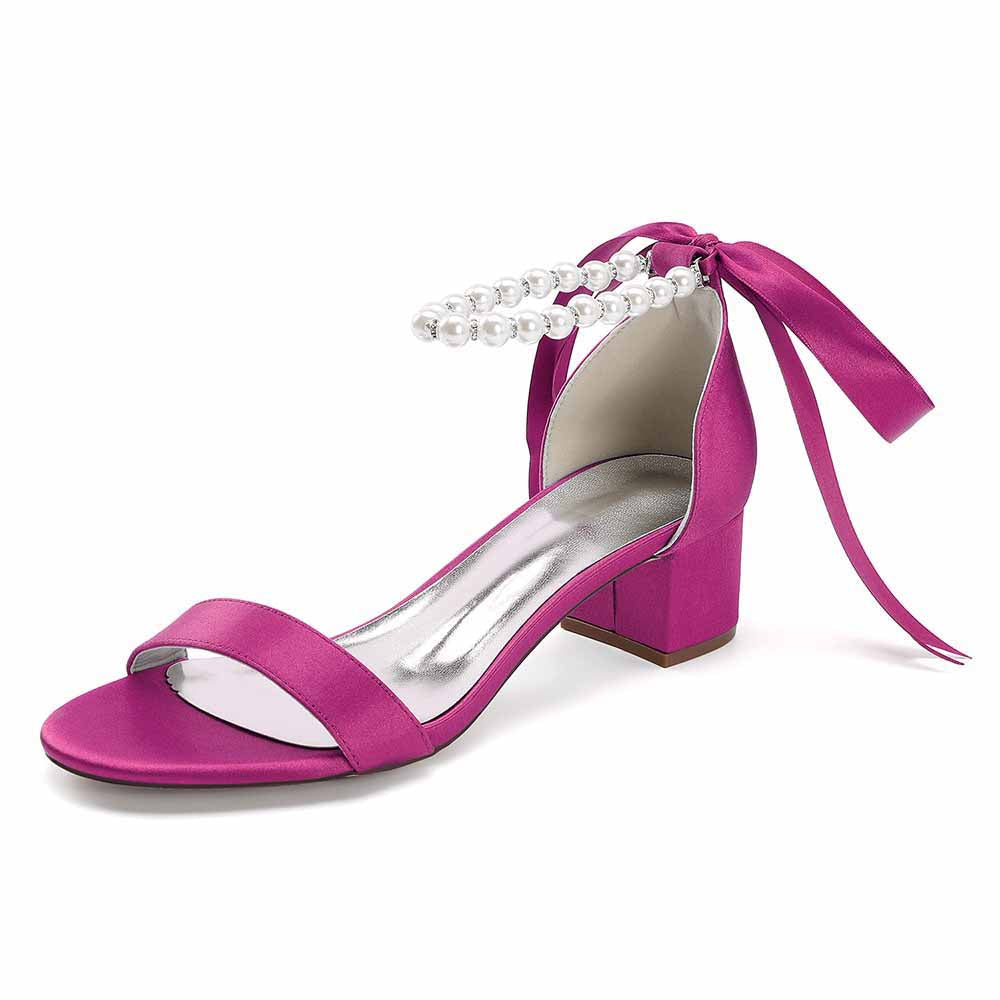 Fuchsia lace up chunky heel dress shoes with pearl accents and a stylish strap design