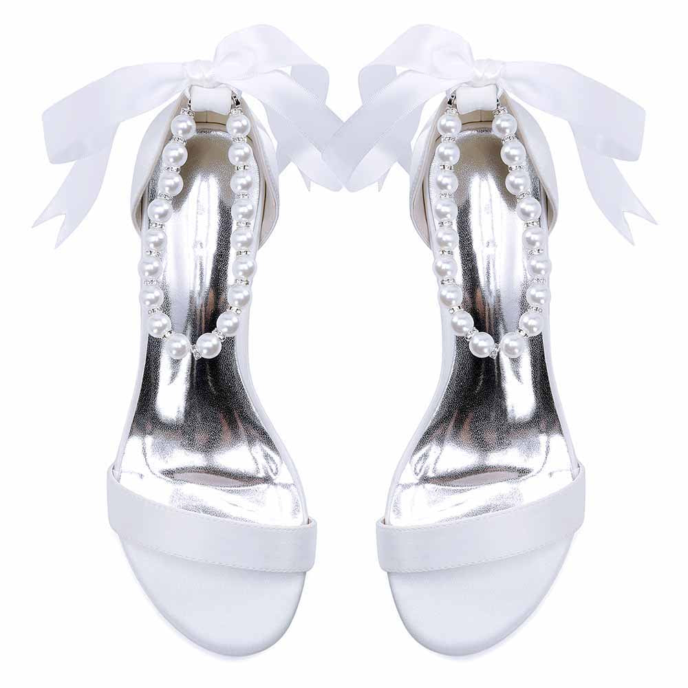 Elegant lace up chunky heel dress shoes with pearl detailing and ribbon ties in white