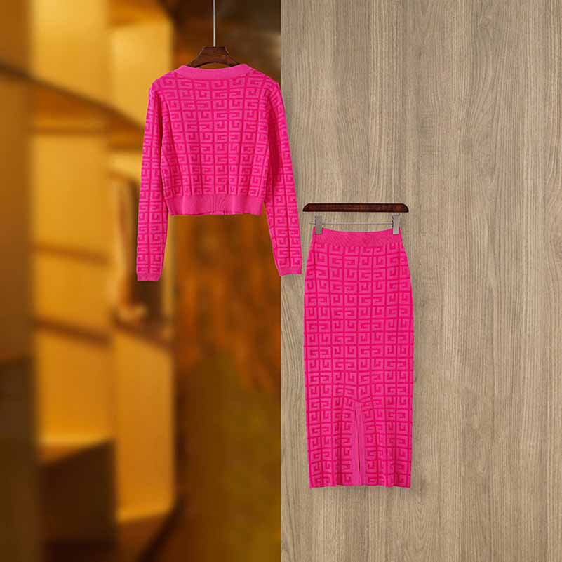 Bright pink long knitted cardigan set featuring a stylish cropped top and matching skirt