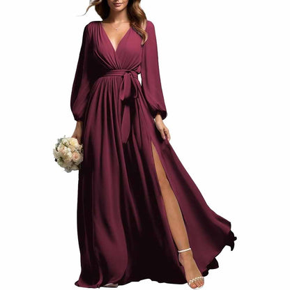 Elegant long sleeve chiffon bridesmaid dress in deep burgundy with a wrap waist and side slit