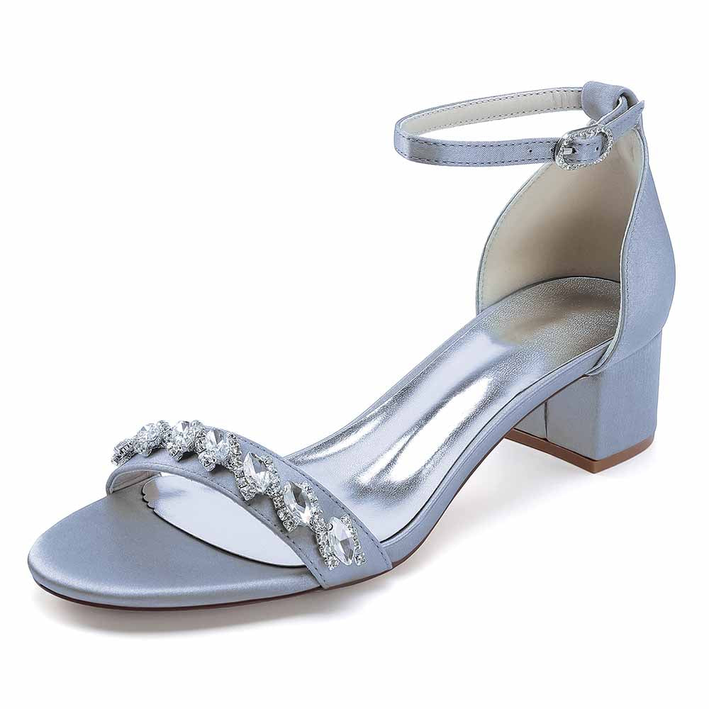 Elegant low block heel dress sandals for wedding in silver with jewel embellishments and ankle strap