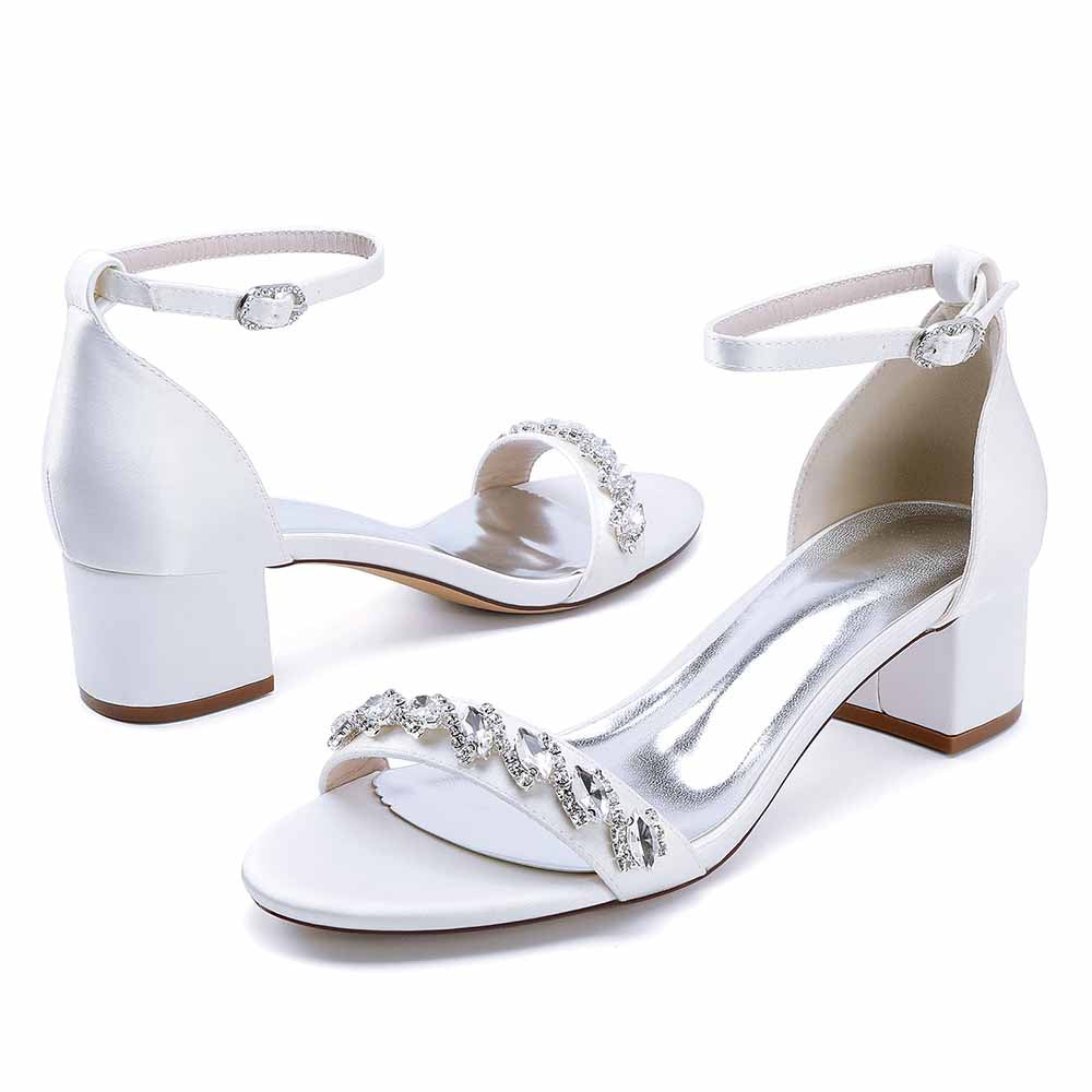 Elegant low block heel dress sandals for wedding with a sparkling beaded design and ankle strap
