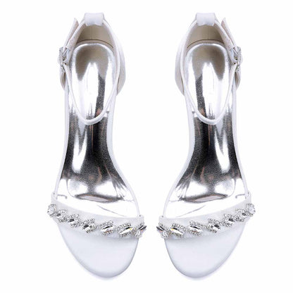 Elegant white low block heel dress sandals for wedding with sparkling rhinestone details