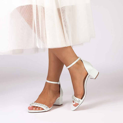 Elegant low block heel dress sandals for wedding featuring sparkling details and ankle strap