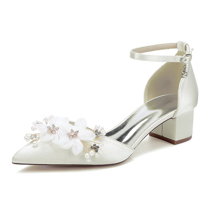 Elegant low block heel wedding shoes women with floral embellishments and ankle strap in ivory satin