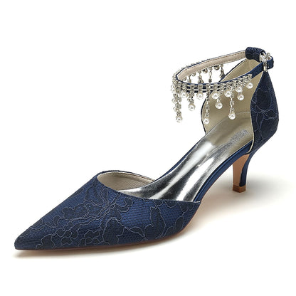 Elegant low heel bridal shoes with ankle strap featuring intricate floral design and sparkling embellishments